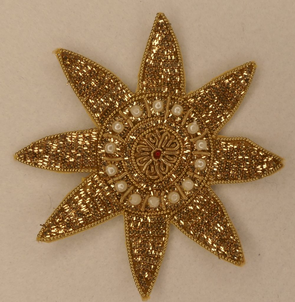 Écusson soleil cannetille