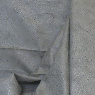 Tissu point argent fond gris