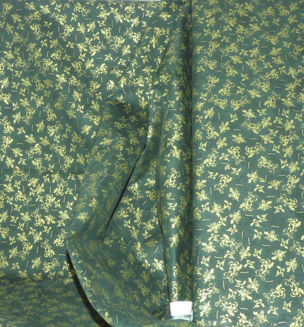 Tissu feuille or fond vert