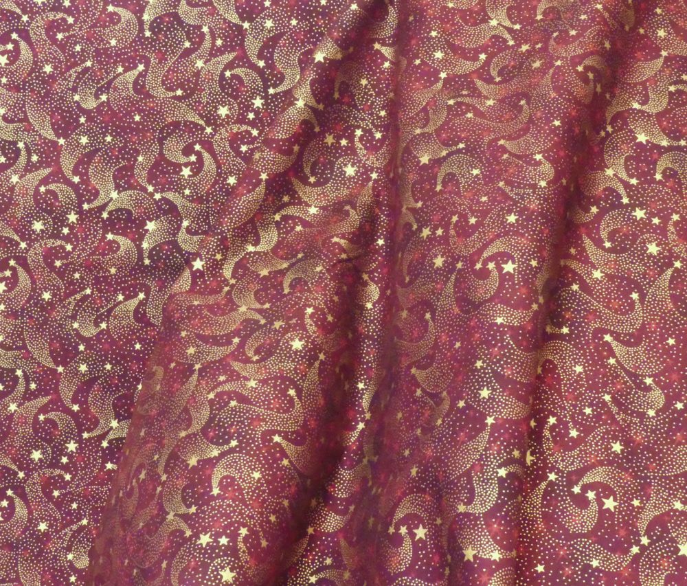 Tissu étoile or fond bordeaux