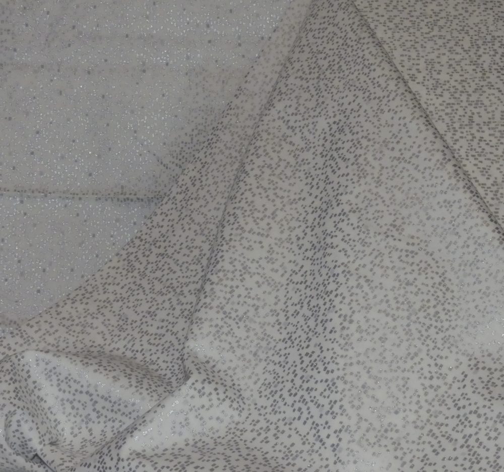 Tissu point fond blanc