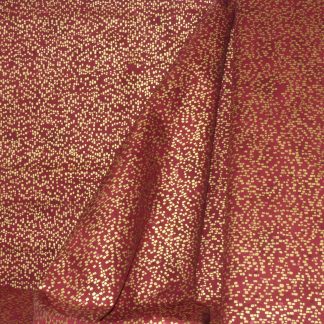 Tissu point or fond bordeaux