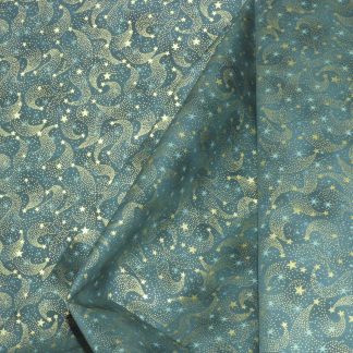 Tissu étoile or fond vert