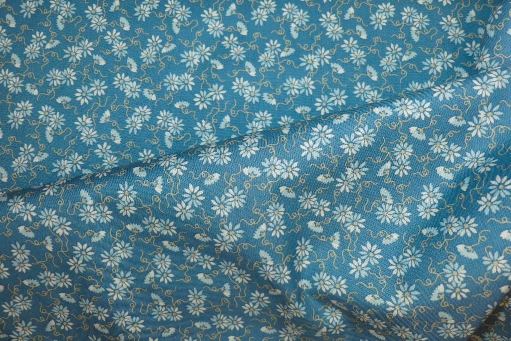 Tissu motif petites fleurs beiges