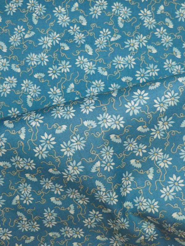 Tissu motif petites fleurs beiges