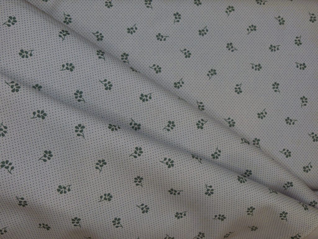 Tissu motif petites fleurs bleues
