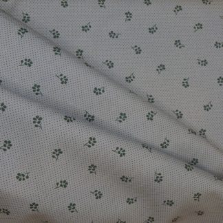Tissu motif petites fleurs bleues
