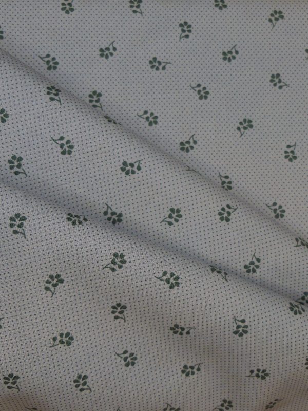 Tissu motif petites fleurs bleues