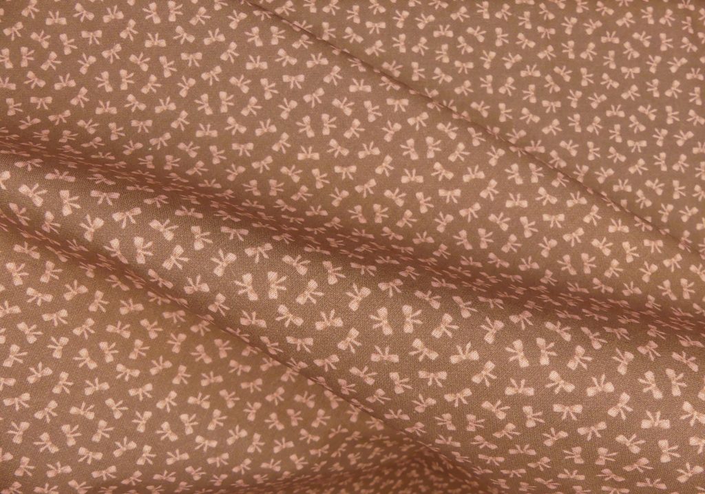 Tissu motif petit noeud