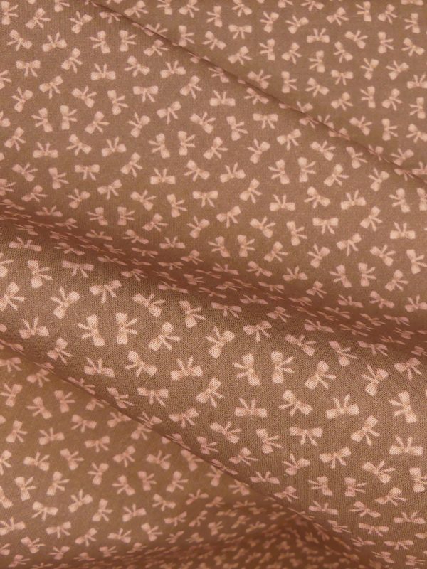 Tissu motif petit noeud
