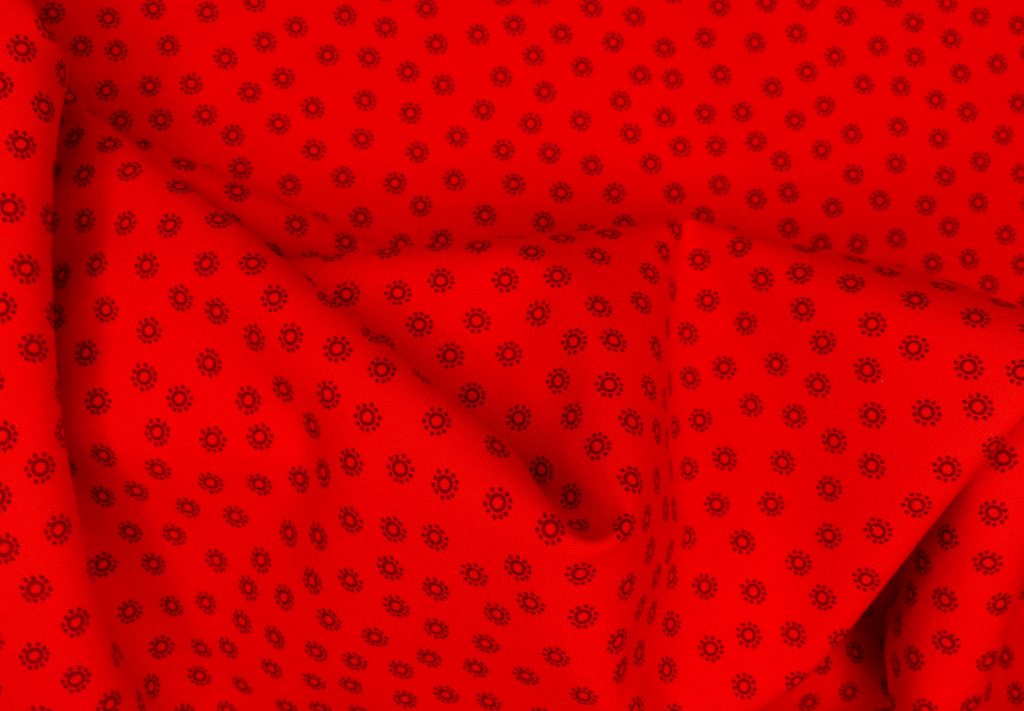 Tissu faux uni rouge