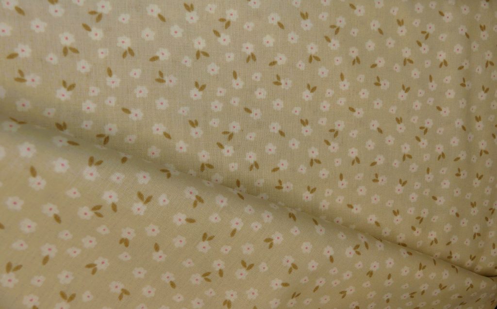 Tissu motif fleurs beige
