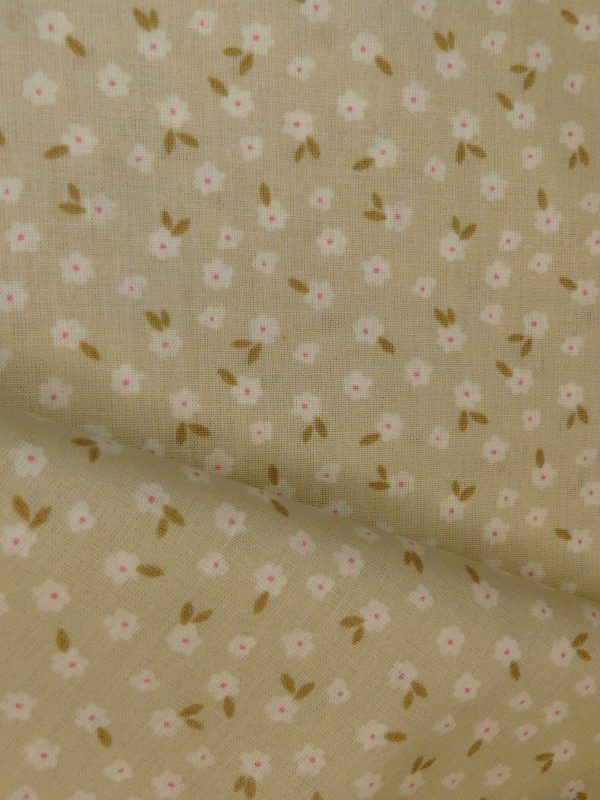 Tissu motif fleurs beige