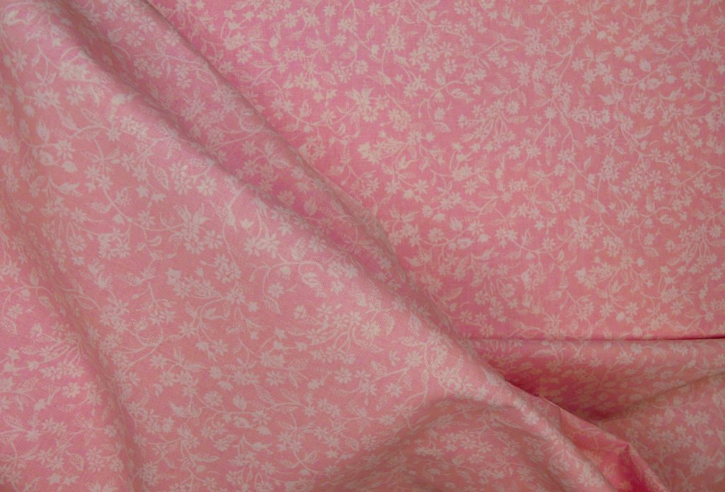 Tissu faux uni rose